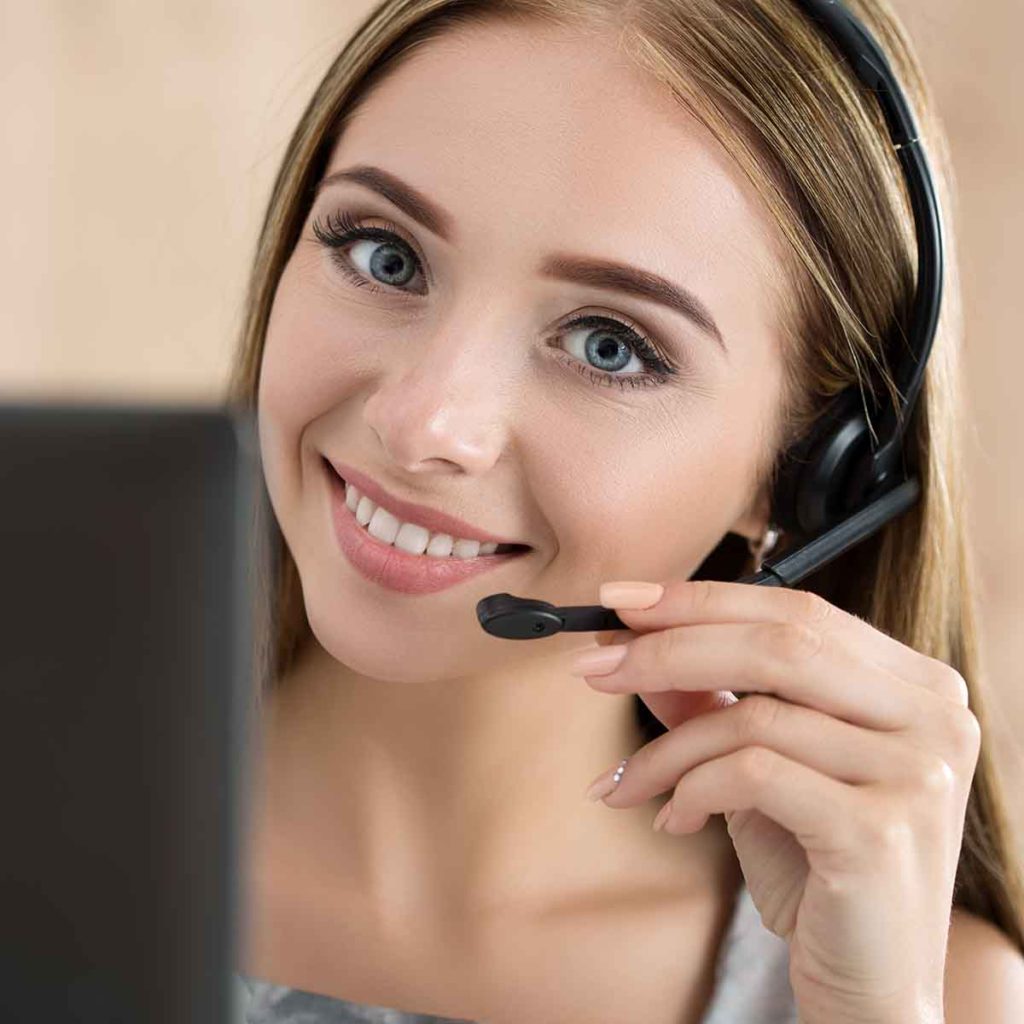 Female receptionist using headset